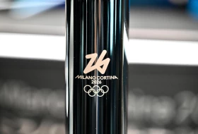 Olimpijska baklja za ZOI predata italijanskim organizatorima