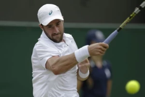 Dimitrov u osmini finala Vimbldona, pobede Muguruse i Kuznjecove