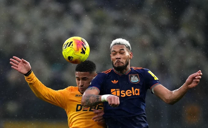 Martin Rickett/PA via AP