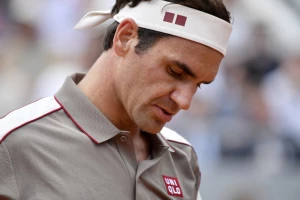 Federerov uspešan start na travi